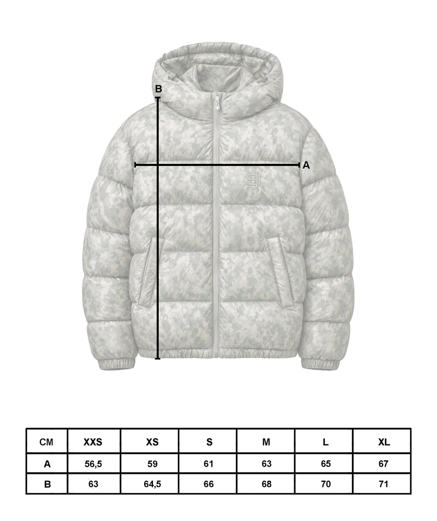 Guide des tailles de la doudoune : A largeur poitrine 56,5 à 67 cm, B longueur 63 à 71 cm, du XXS au XL